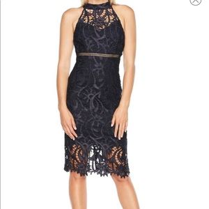 Bardot is a lace halter dress